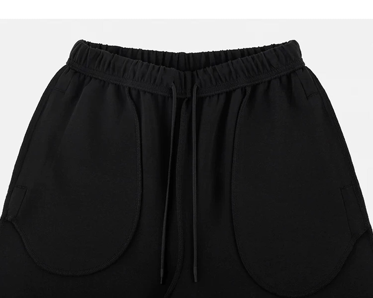 IDLT wide leg sweatpants, black inner waistband and pockets.