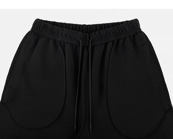 IDLT wide leg sweatpants, black inner waistband and pockets.