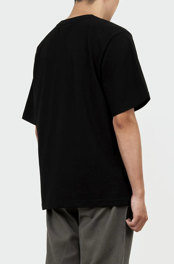 IDLT T-shirt, black back on model.