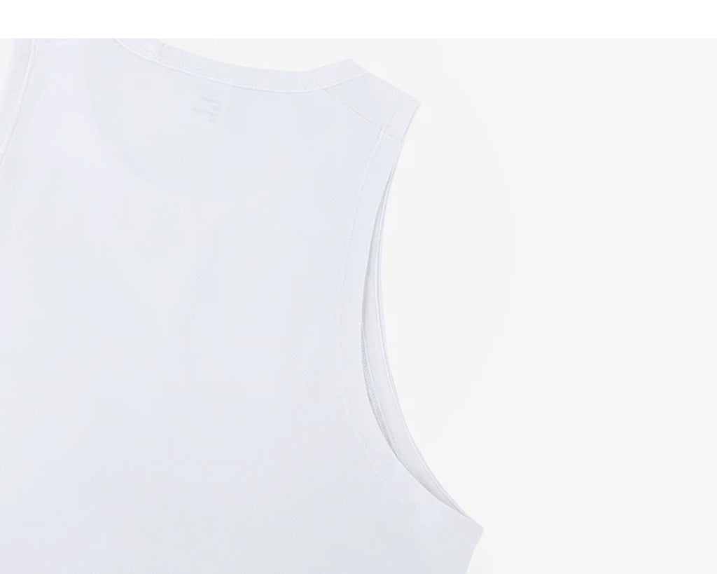 IDLT tank top, white back shoulder and armhole.