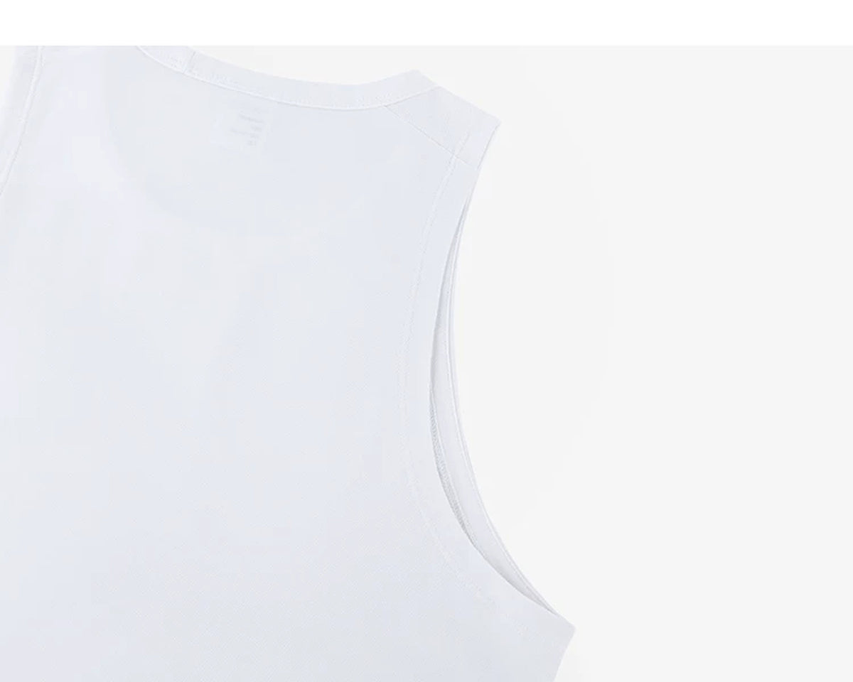 IDLT tank top, white back shoulder and armhole.