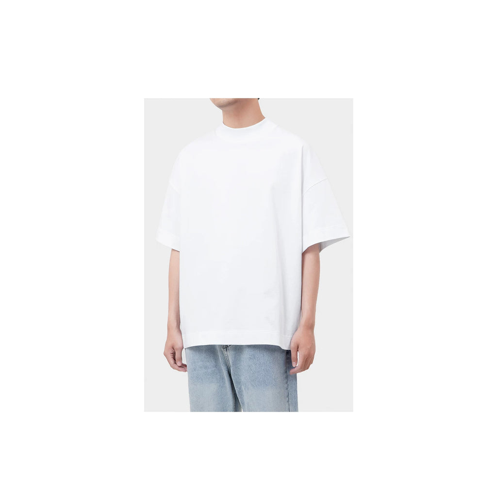 IDLT T-shirt, white front three-quarter view on model.