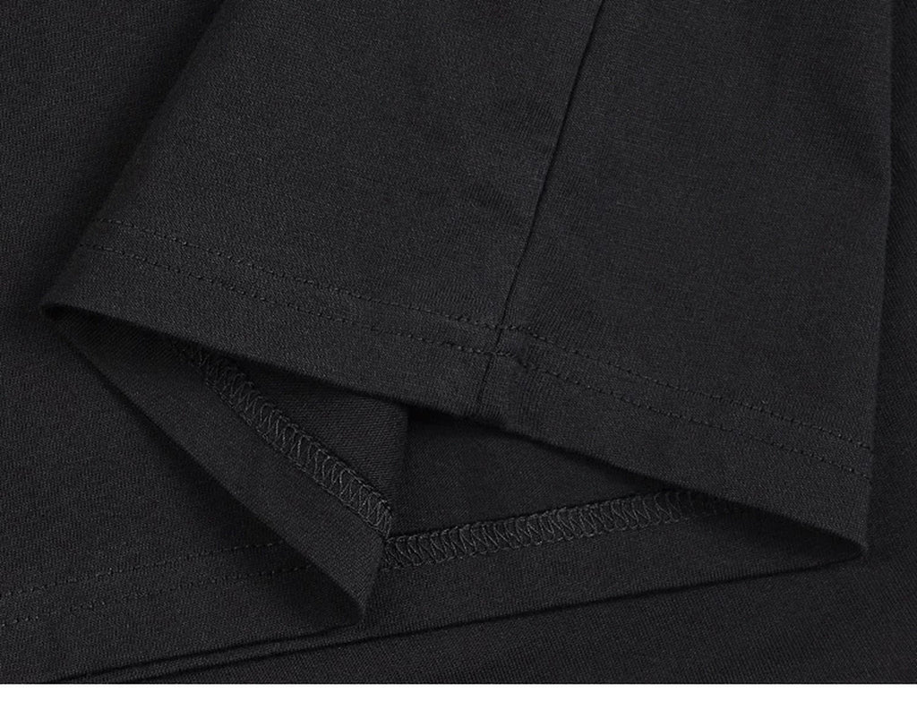 IDLT sleeveless T-shirt, black folded hem.