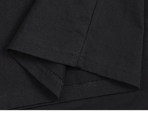 IDLT sleeveless T-shirt, black folded hem.
