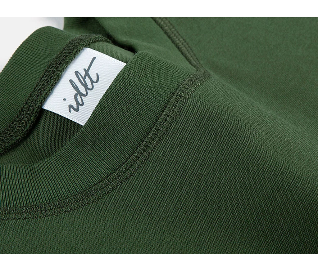 IDLT logo T-shirt, green neckline label.
