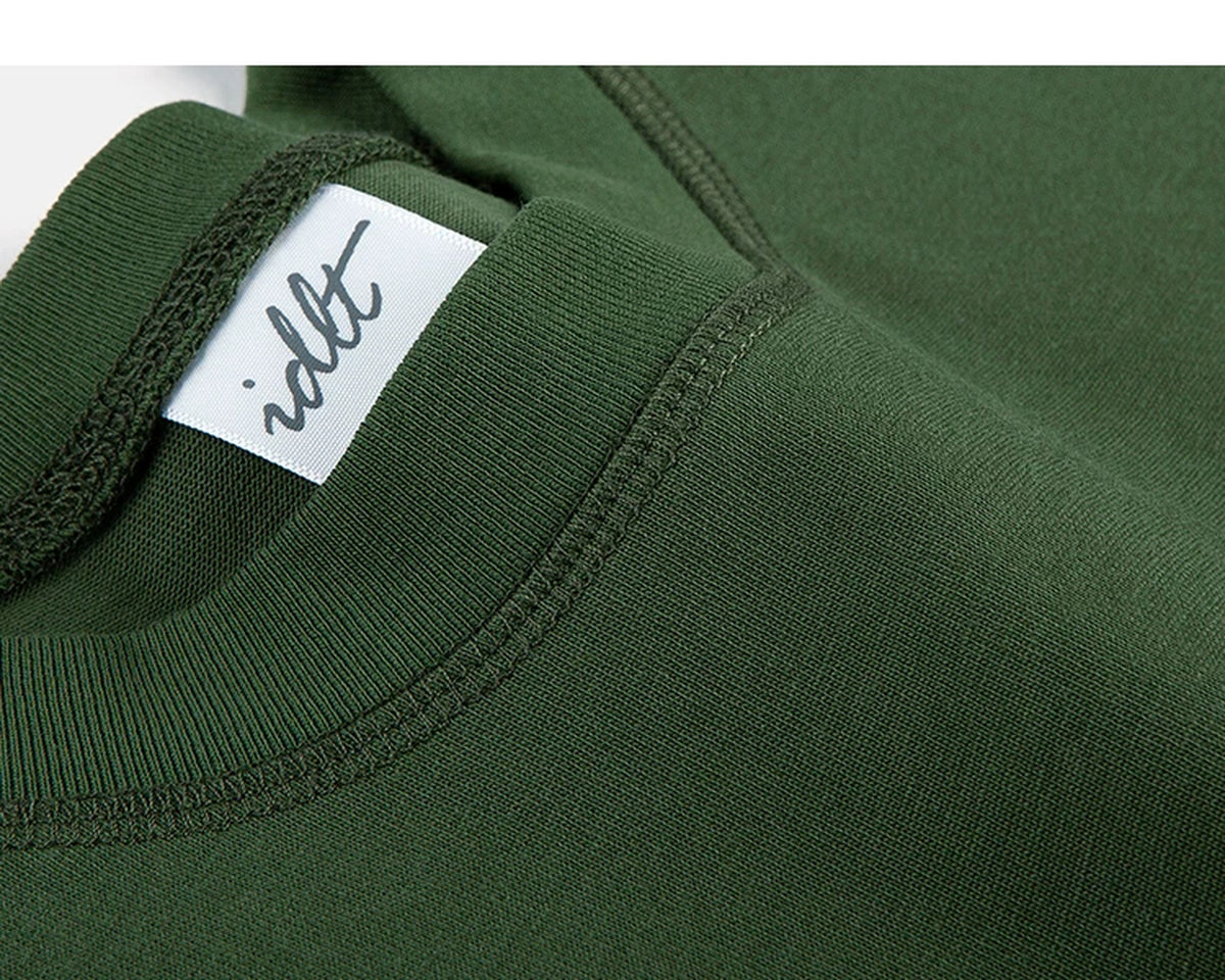IDLT logo T-shirt, green neckline label.