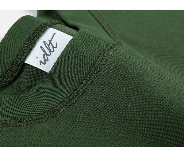 IDLT logo T-shirt, green neckline label.