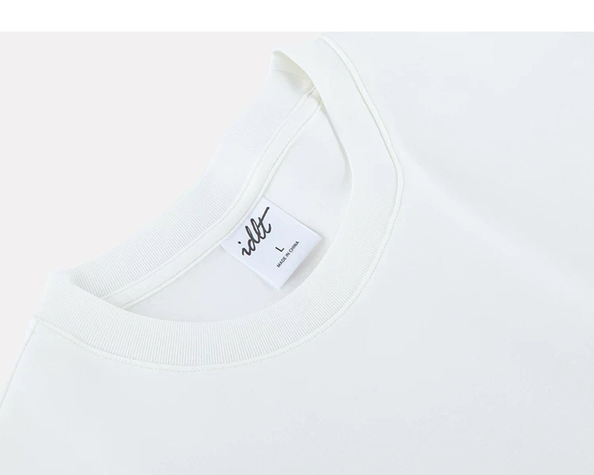 IDLT T-shirt, white angled neckline label.