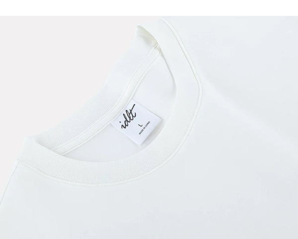 IDLT T-shirt, white angled neckline label.