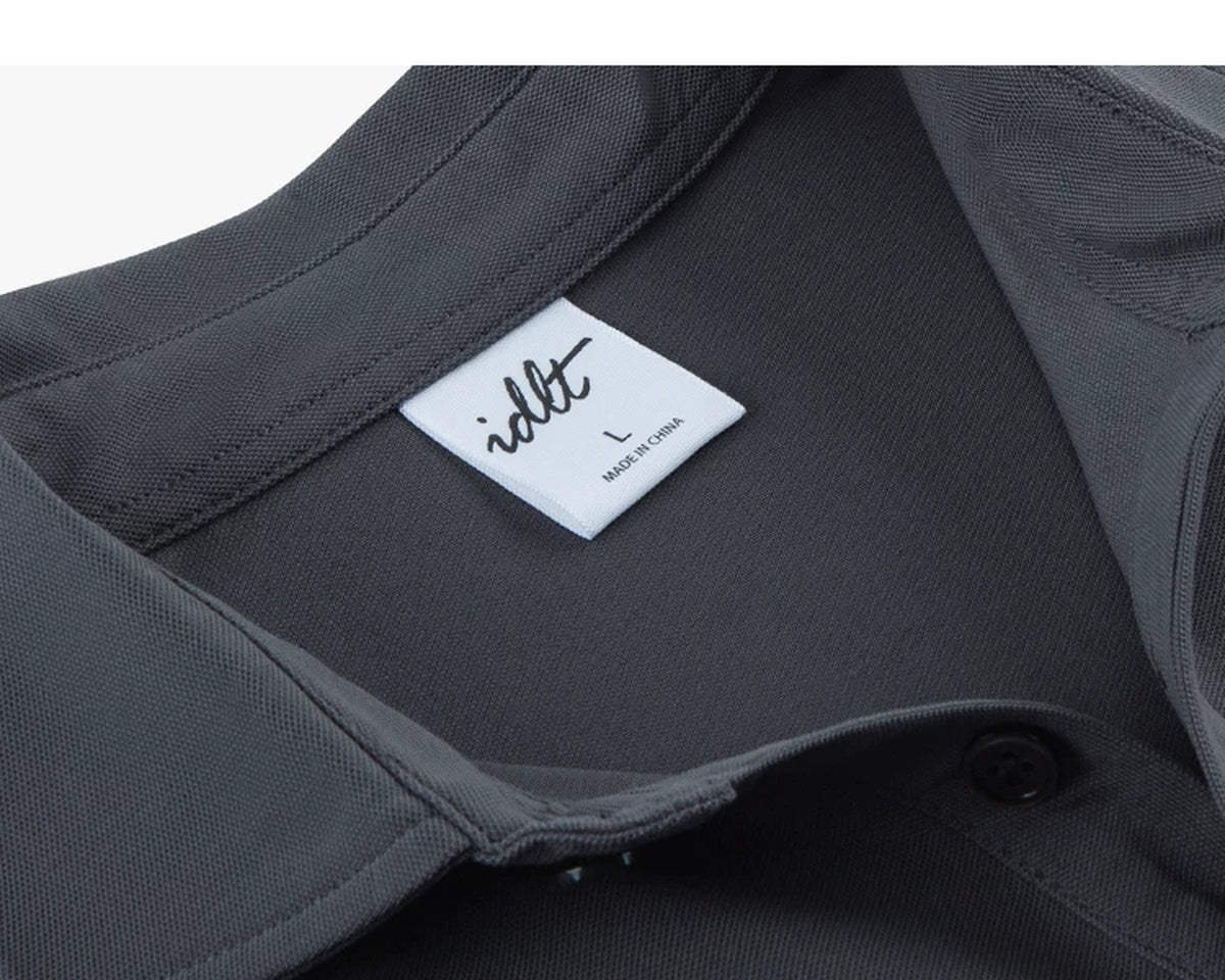 IDLT polo shirt, dark gray neckline label.