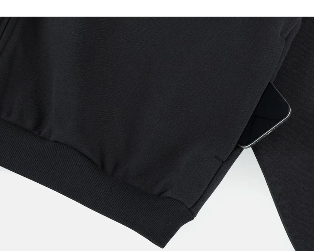 IDLT zip hoodie, black side pocket.