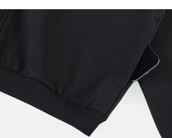 IDLT zip hoodie, black side pocket.