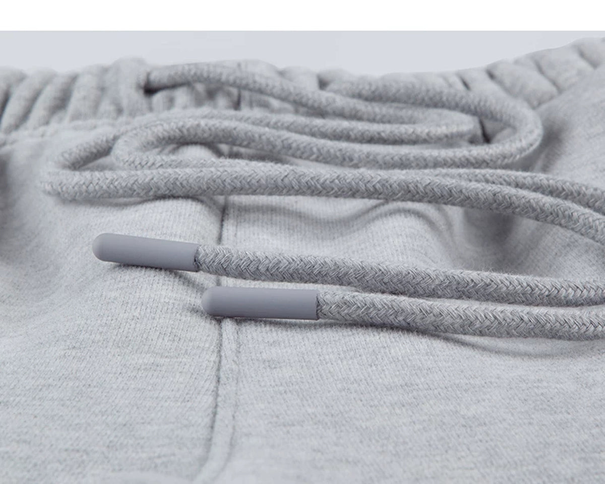 IDLT wide leg sweatpants, heather gray drawstring tips.