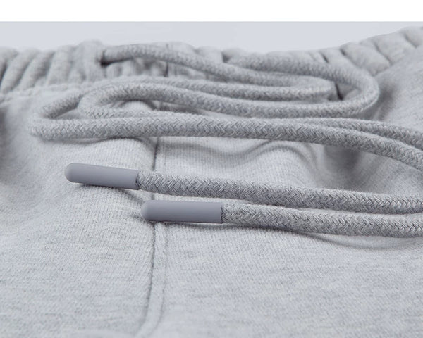 IDLT wide leg sweatpants, heather gray drawstring tips.