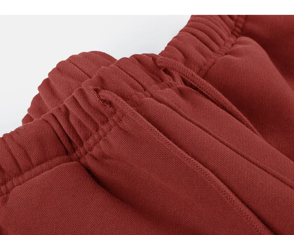 IDLT wide leg sweatpants, red waistband stitching.