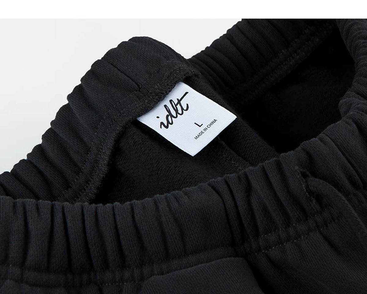 IDLT wide leg sweatpants, black waistband label.