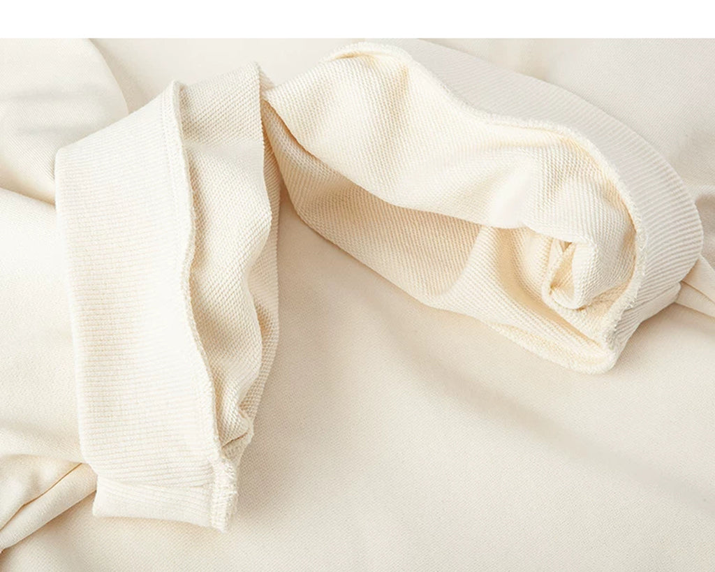 IDLT short sleeve sweatshirt, cream turned sleeve cuffs.