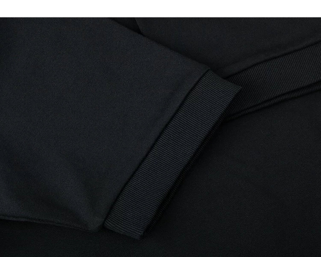 IDLT short sleeve sweatshirt, black sleeve cuff close-up.