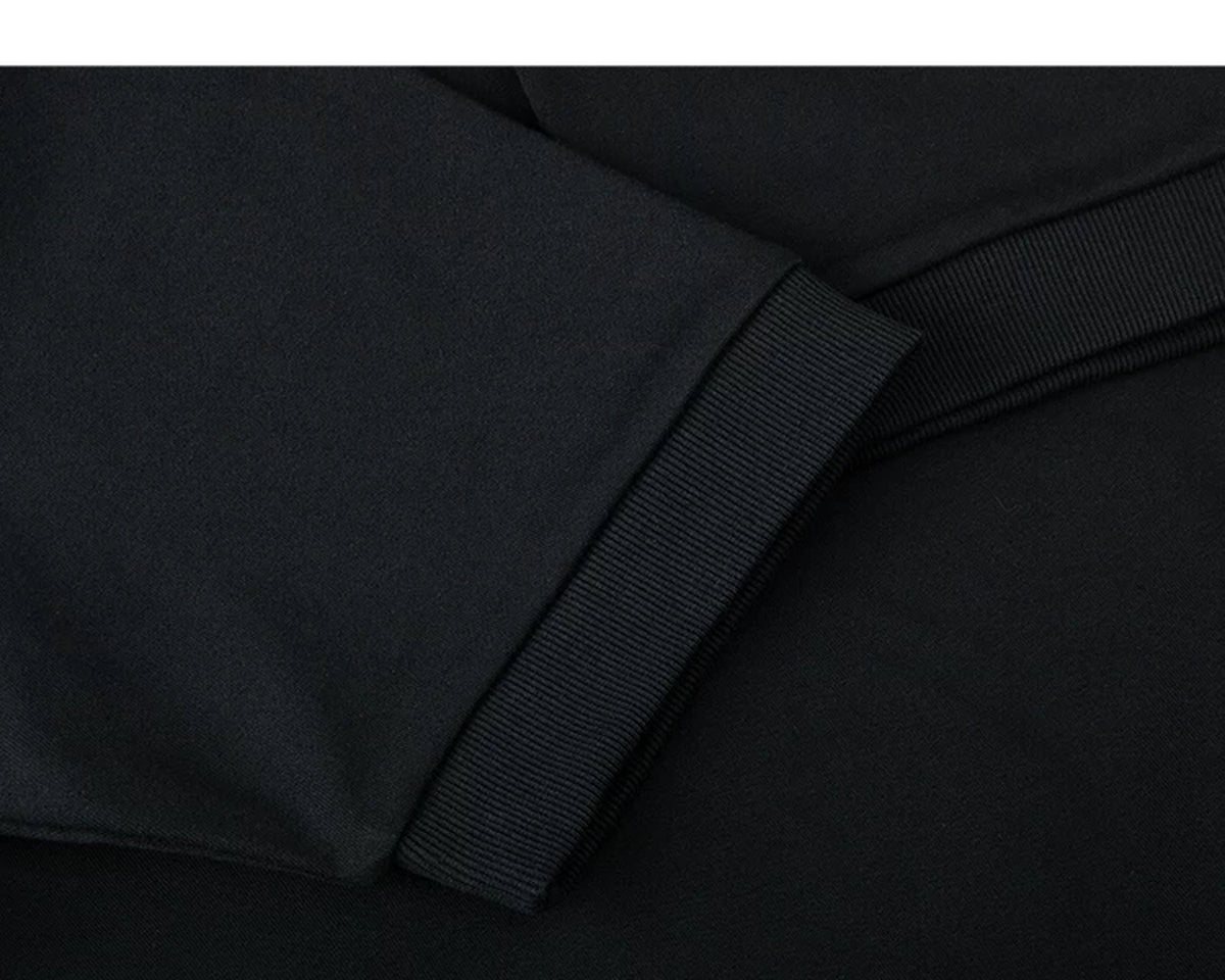 IDLT short sleeve sweatshirt, black sleeve cuff close-up.