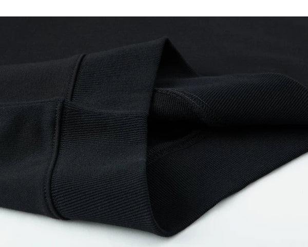 IDLT short sleeve sweatshirt, black folded ribbed hem.