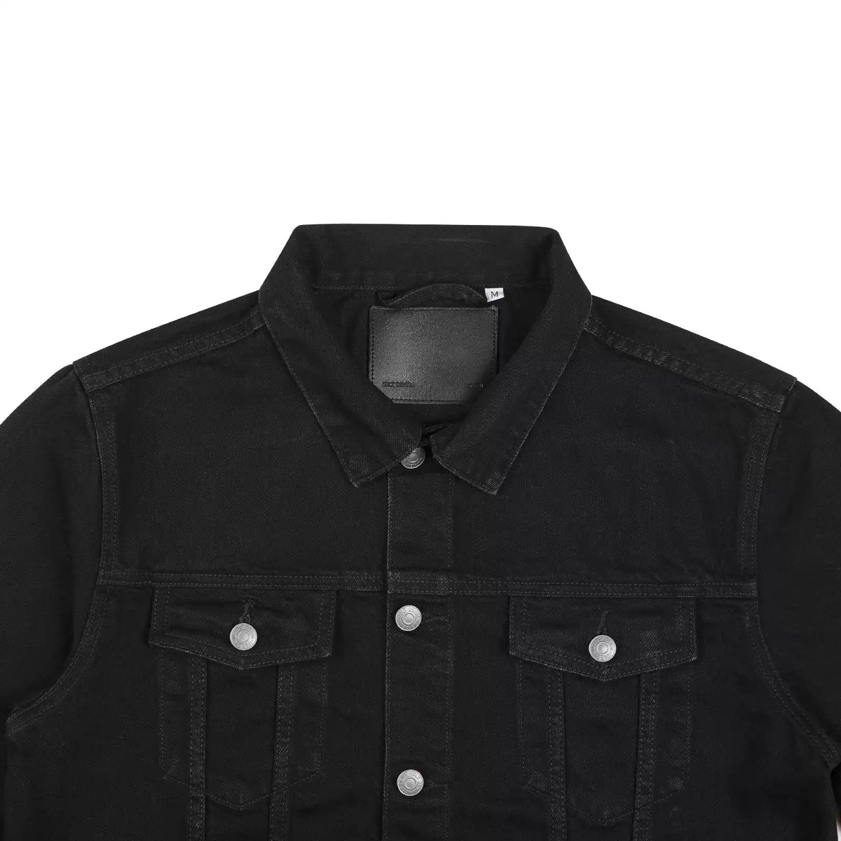 IDLT denim jacket, black collar and chest pockets.