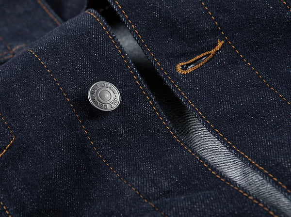 IDLT denim jacket, dark blue button and buttonhole.