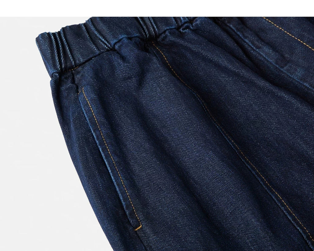 IDLT drawstring jeans, dark blue angled waistband and pocket.