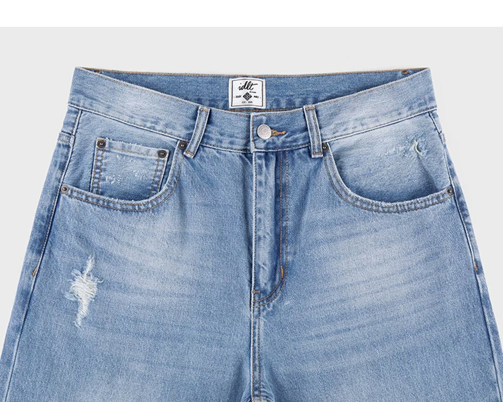IDLT jeans, light blue waistband and front pockets.