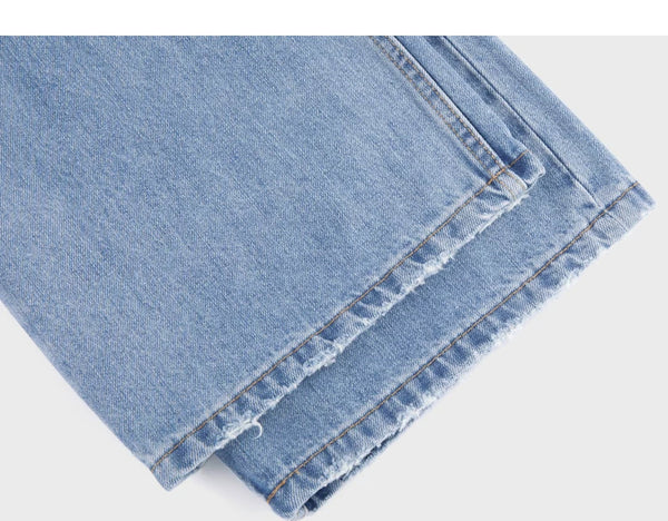 IDLT jeans, light blue leg hems.