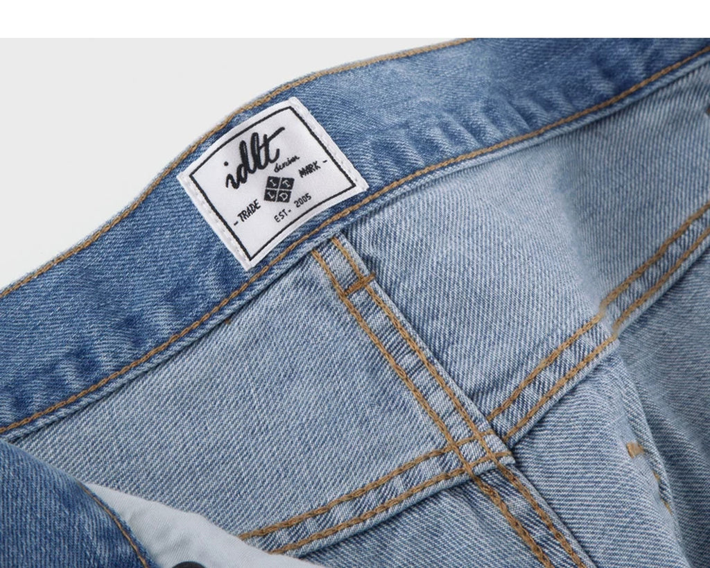 IDLT jeans, light blue inner label.