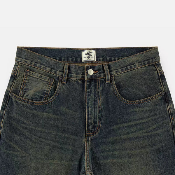 IDLT jeans, dark washed waistband overview.