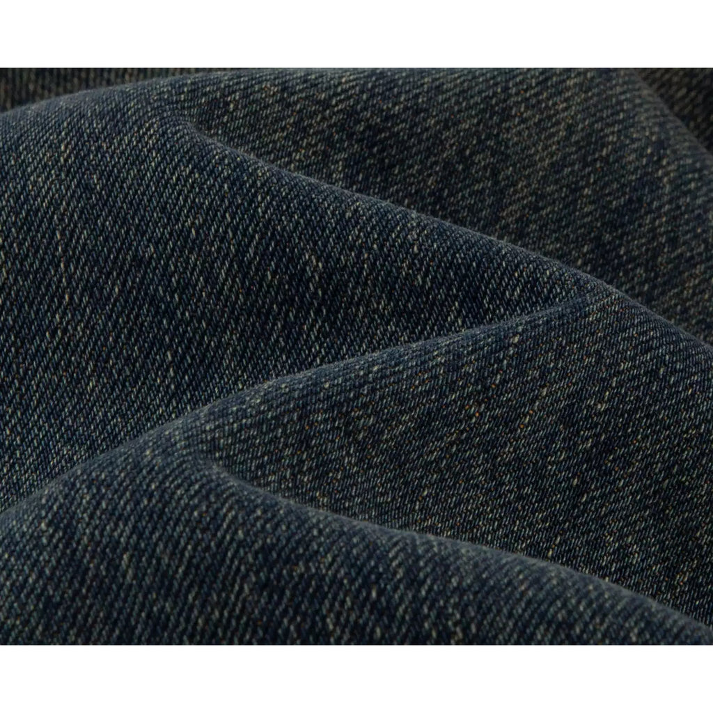 IDLT jeans, dark washed denim texture.