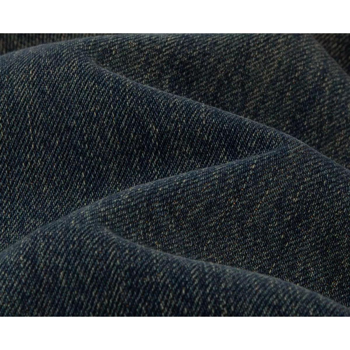 IDLT jeans, dark washed denim texture.