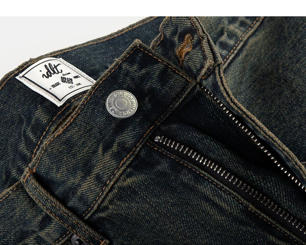 IDLT jeans, dark washed waist button and label.