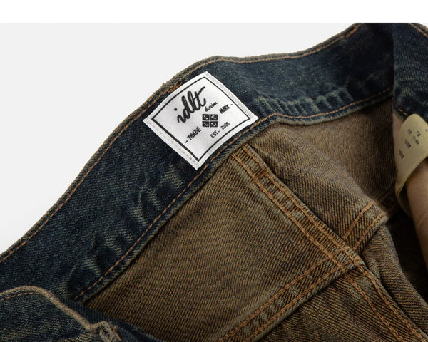 IDLT jeans, dark washed inner label.