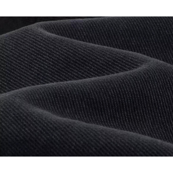 IDLT jeans, washed black denim texture.