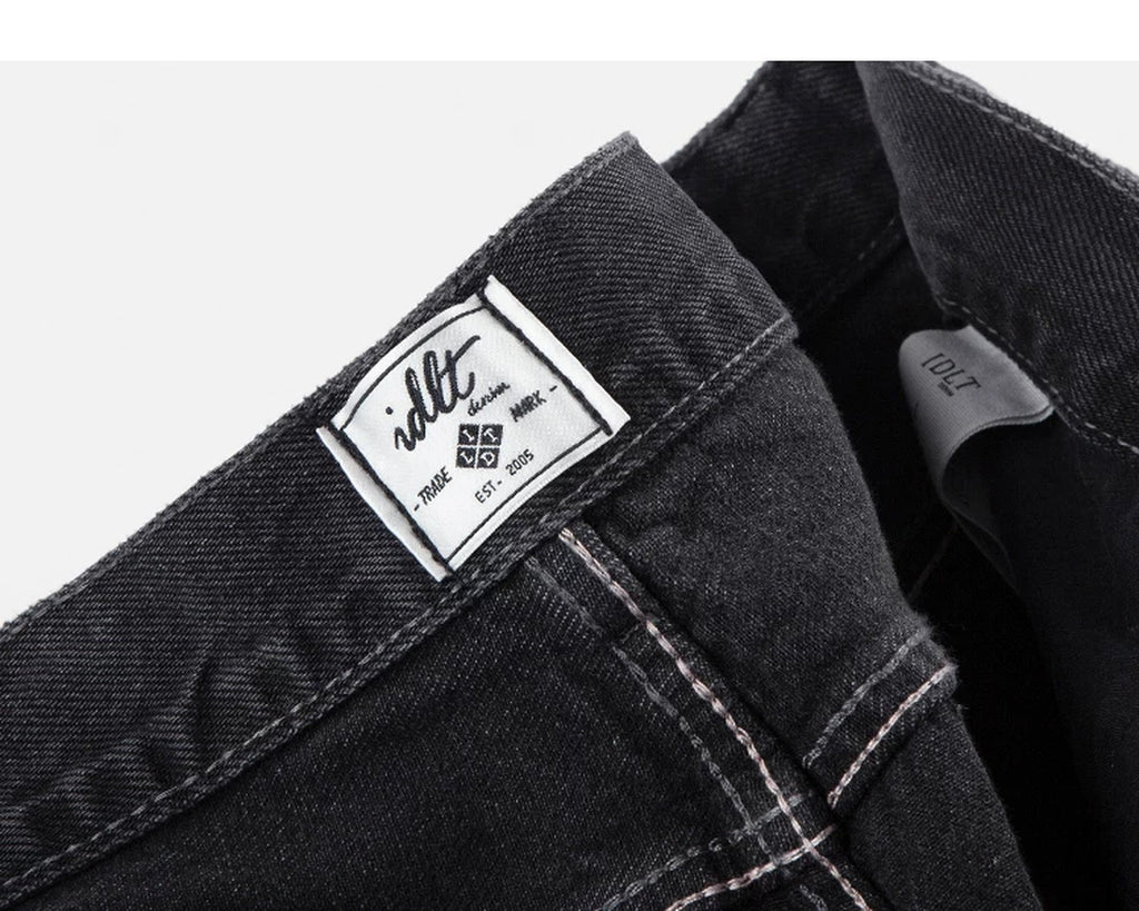 IDLT jeans, washed black inner label.