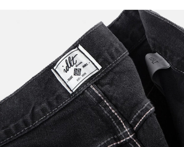 IDLT jeans, washed black inner label.
