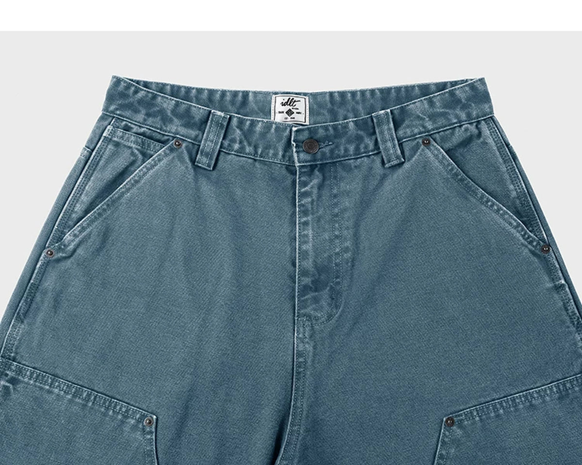 IDLT carpenter pants, blue waistband and pockets.