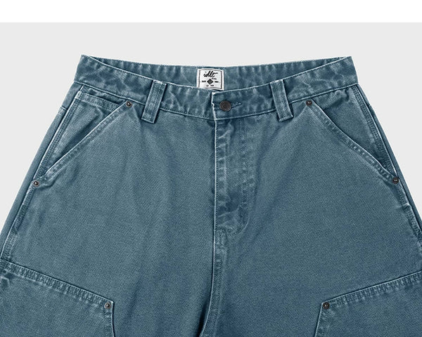 IDLT carpenter pants, blue waistband and pockets.
