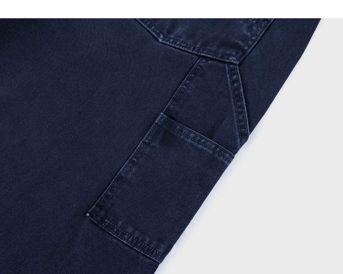 IDLT carpenter pants, dark blue utility pocket.