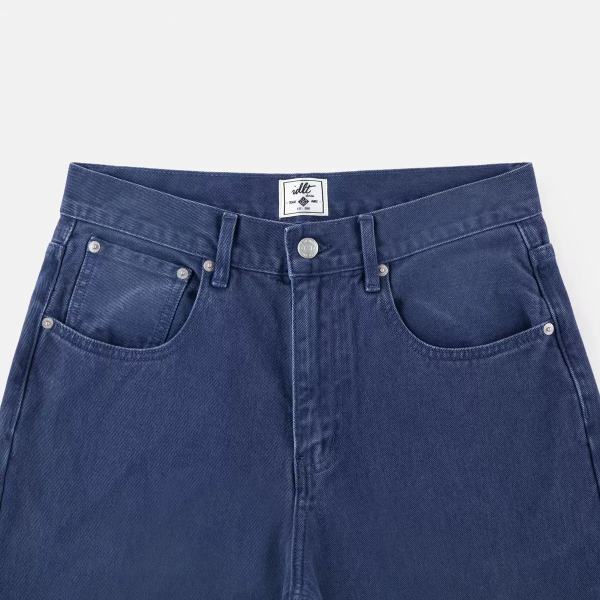IDLT jeans, blue waistband overview.