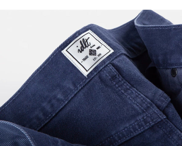 IDLT jeans, blue inner label.