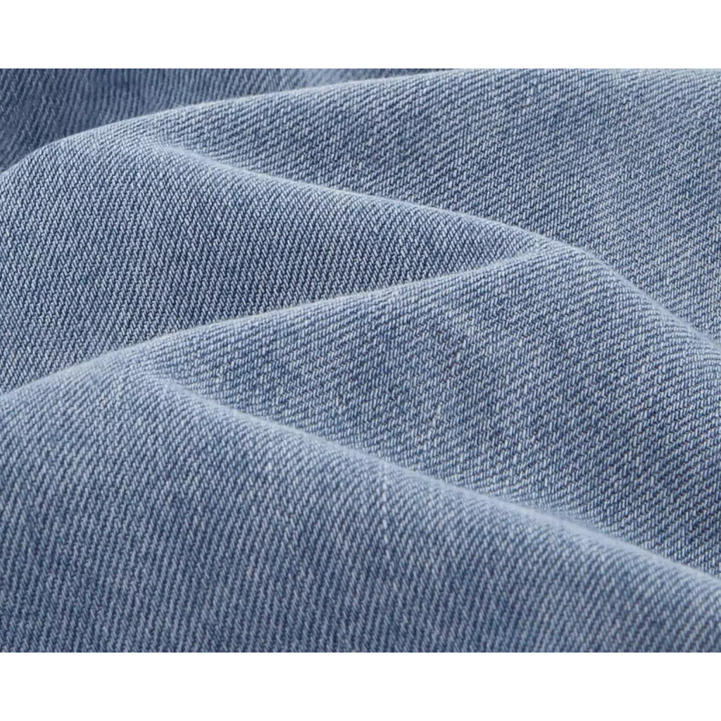IDLT denim shorts, light blue denim texture.