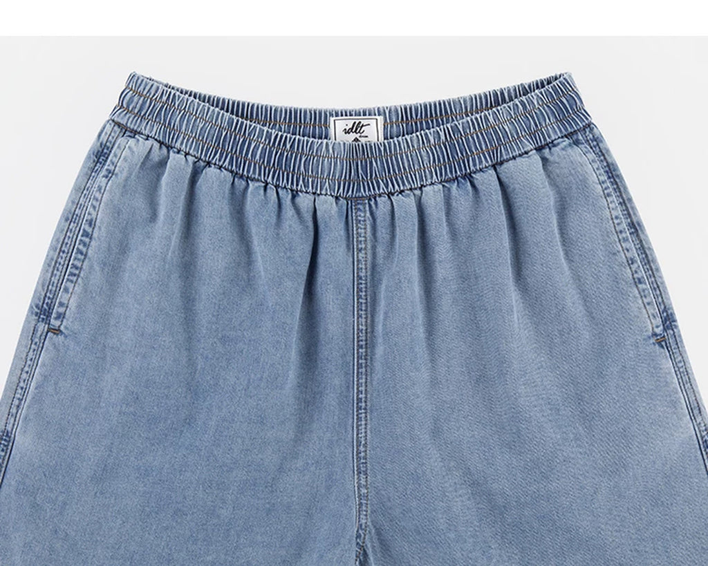 IDLT denim shorts, light blue elastic waistband and pockets.