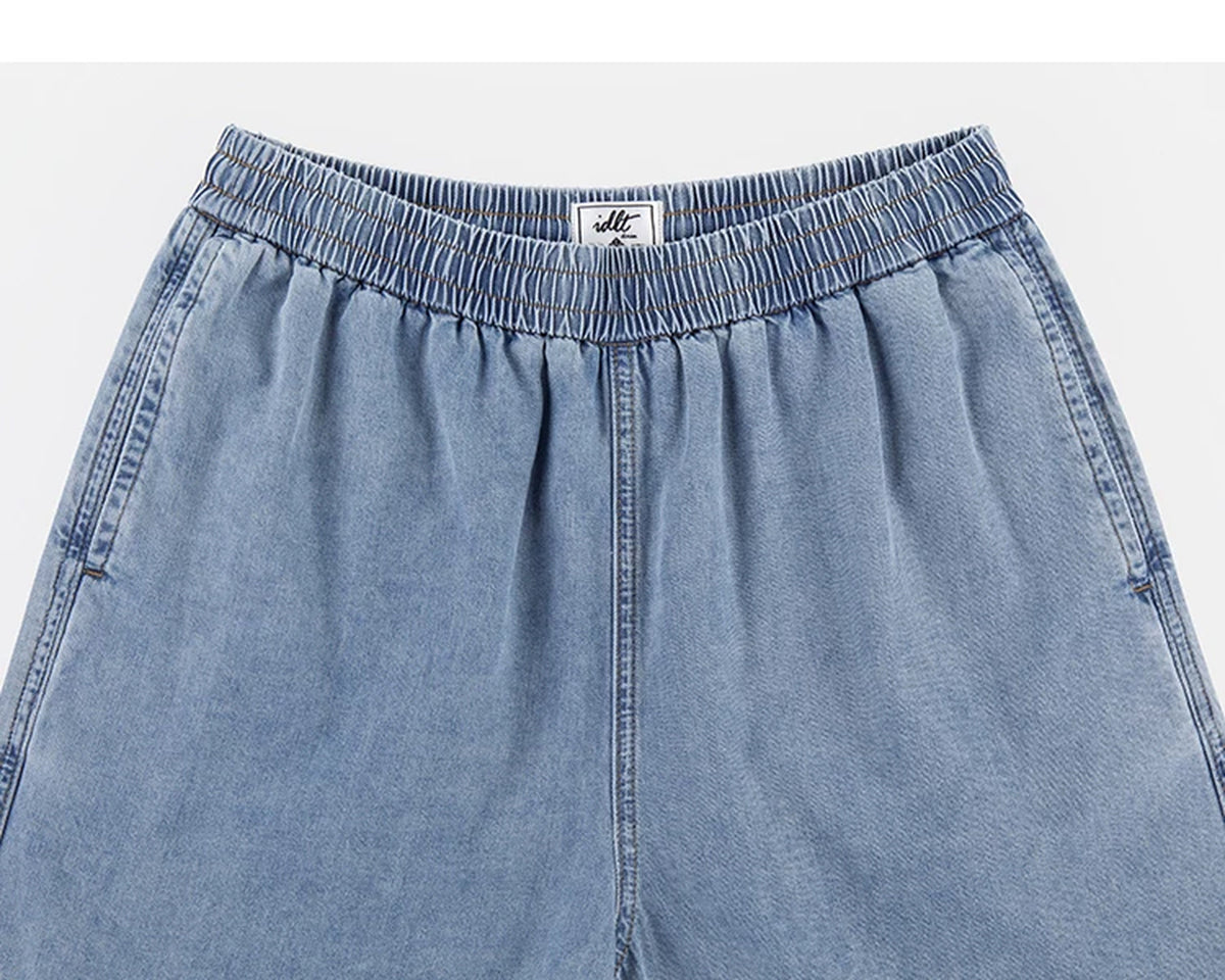IDLT denim shorts, light blue elastic waistband and pockets.