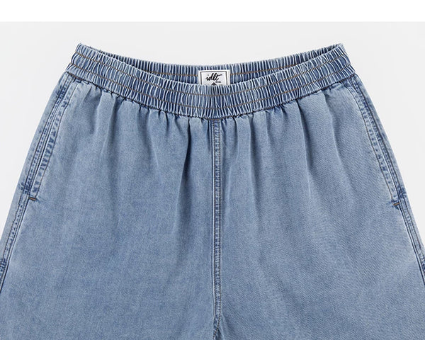 IDLT denim shorts, light blue elastic waistband and pockets.
