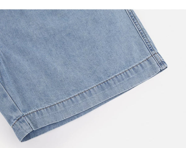 IDLT denim shorts, light blue hem stitching.