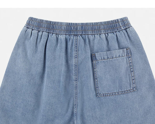 IDLT denim shorts, light blue back waistband.
