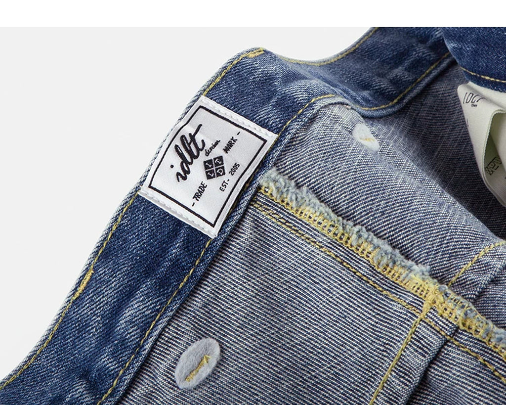 IDLT jeans, washed blue inner label.